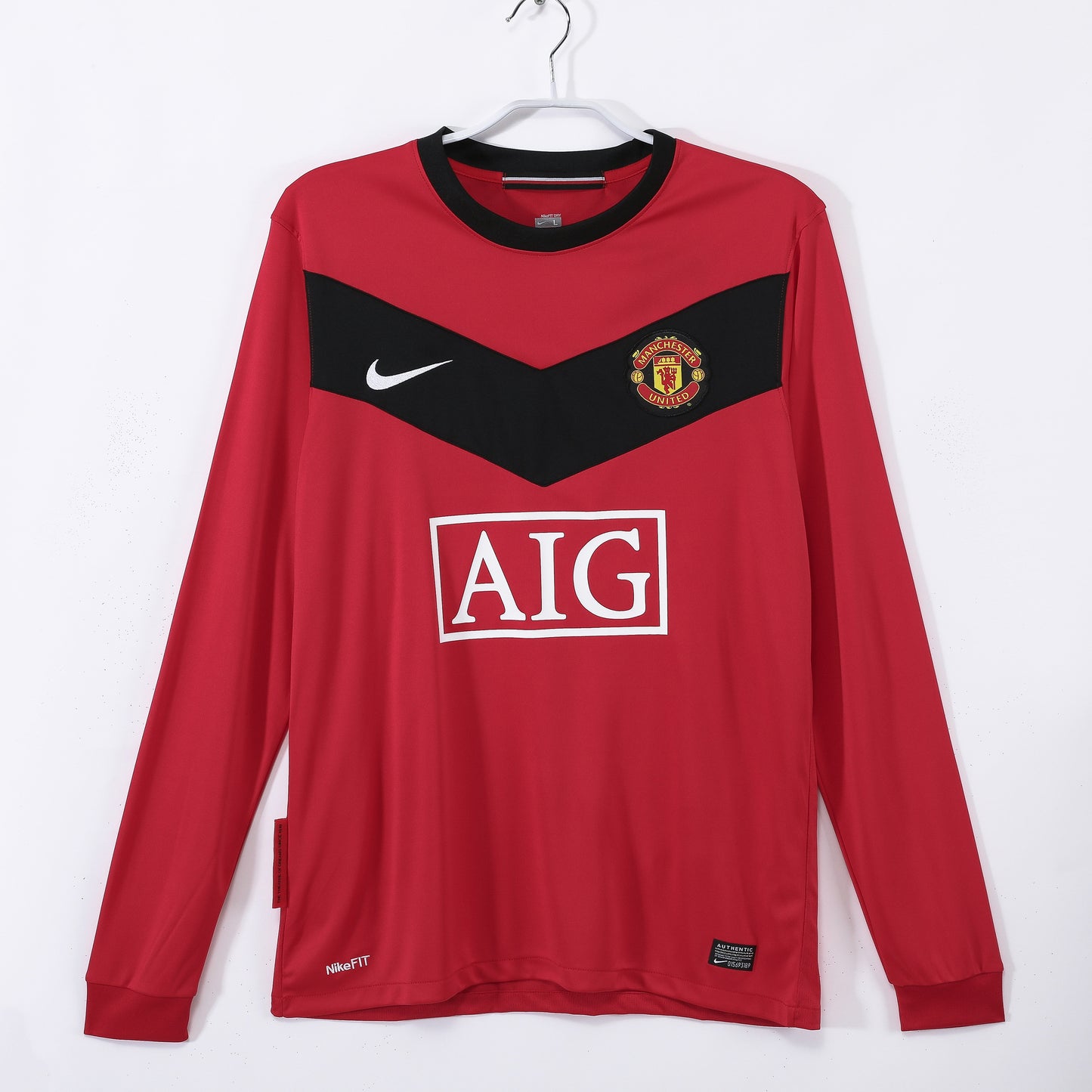 Maillot de football rétro domicile à manches longues Manchester United 2010
